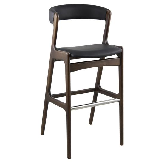 Front view of a Randers barstool. It has a dark wood frame, black upholstered seat and back, and a silver footrest.