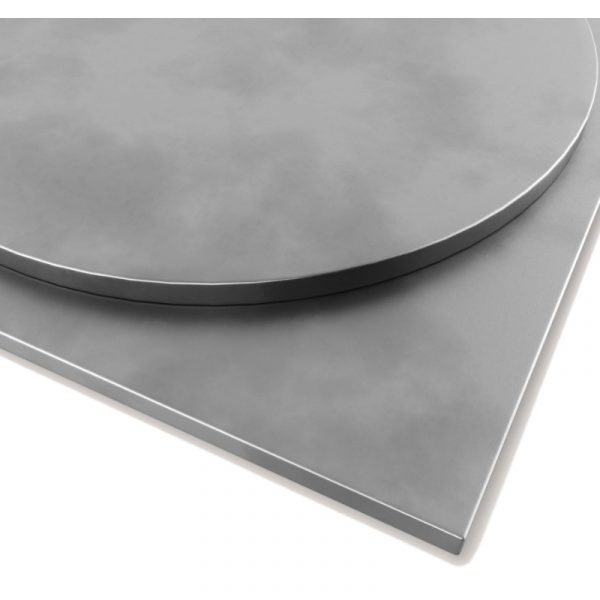 Close-up of round and square METAL ZINC SATIN TABLE TOP showing the smooth metal surface.