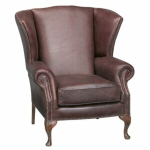 Front view of a brown leather Barton wing lounge chair with nailhead trim and wood legs.