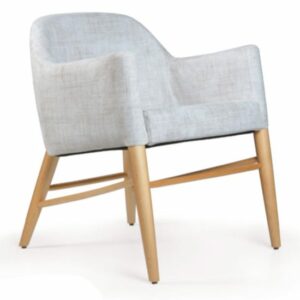 Angled view of a Canada lounge chair. Upholstered in light grey fabric with a beech wood frame.