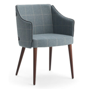 Upholstered Poppy armchair in blue plaid fabric with solid beech frame and armrests.