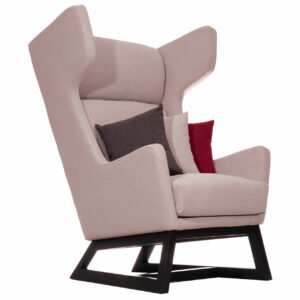 Angled view of a beige Dupe Lounge Chair with a dark wood frame and accent pillows.