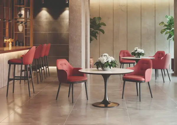 Red upholstered Rise Armchair with button detail set at a round dining table in a contemporary lounge setting.