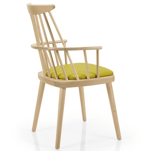 Bam Armchair with light wood spindle back and arms, featuring a vibrant green upholstered seat, side angle view.