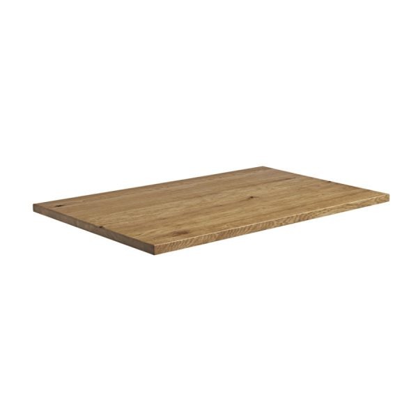 Angled view of a wood rustic antique oak table top, showing the grain and texture.