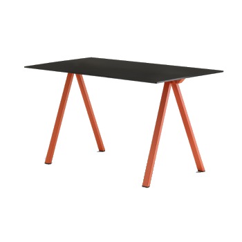 Arki 7 desk table with a black laminate top and orange metal A-frame legs.