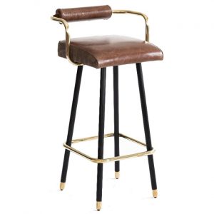 Angled view of the Armrest B2 bar stool. It has a brown upholstered seat and backrest, a gold metal frame, and black legs with gold accents.