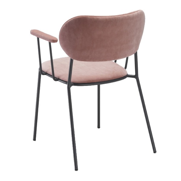 Back view of the Nuta light armchair. Upholstered in pink fabric with a black metal frame.