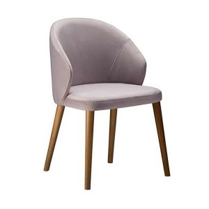 Front view of the Serene armchair. Upholstered in light purple fabric with wooden legs.