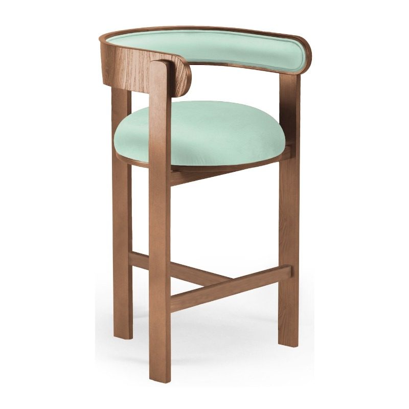 Moulin barstool, front view. Wooden frame with upholstered seat and back in light green fabric.