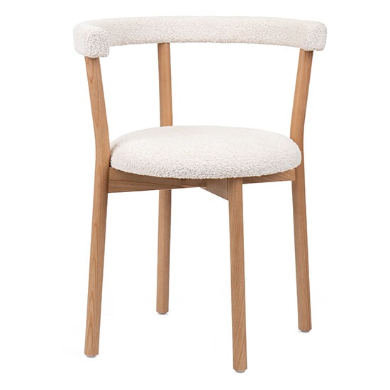 Front view of a Twist U Side chair. The wooden frame supports a round, white, upholstered seat and back.