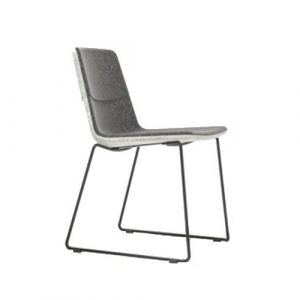 Side view of a gray Twist + Sit M Side Chair with a black metal wire frame base. The seat and back are upholstered. Stackable design.