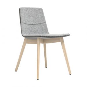 Side view of a gray upholstered Twist + Sit Side Chair with a solid ash wood base.