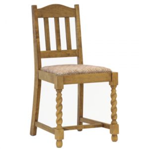Front view of a York W Dining Chair. Wood frame with upholstered seat and twisted front legs.