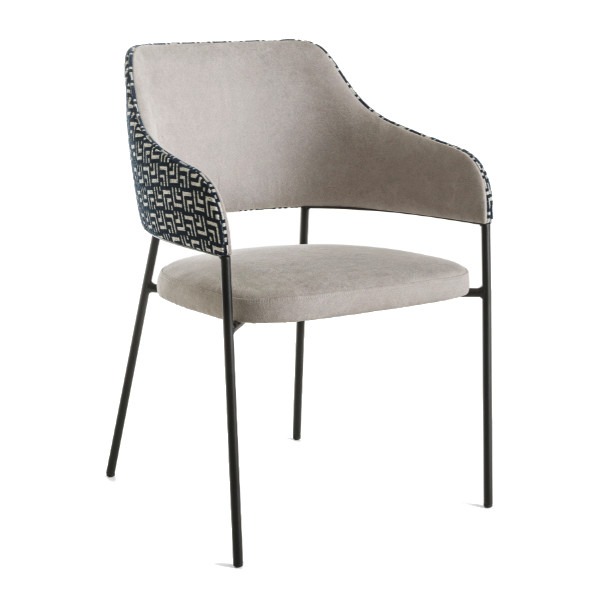Upholstered Monza armchair with metal frame. The seat and back are light gray fabric, with patterned fabric on the back. Stackable.