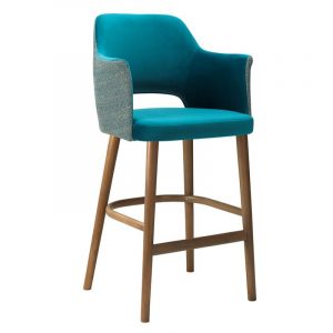 Upholstered Swish barstool with curved arms. Teal seat and back, patterned sides, and wood frame.