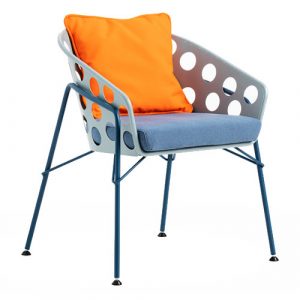 Bolle armchair with blue metal frame, upholstered seat, and orange pillow. The chair back has a pattern of round cutouts.
