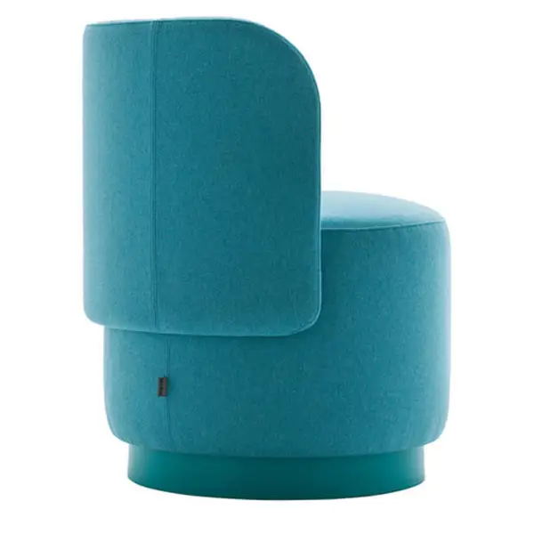 Side view of the upholstered Tablet Pouff in teal fabric. Wooden frame, plinth available in stained/lacquered finish. Modern stool.