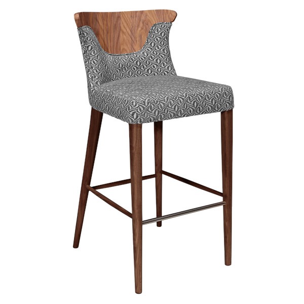 Angled view of the Cross barstool. Wood frame with upholstered seat and back in gray patterned fabric. Foot rest included.