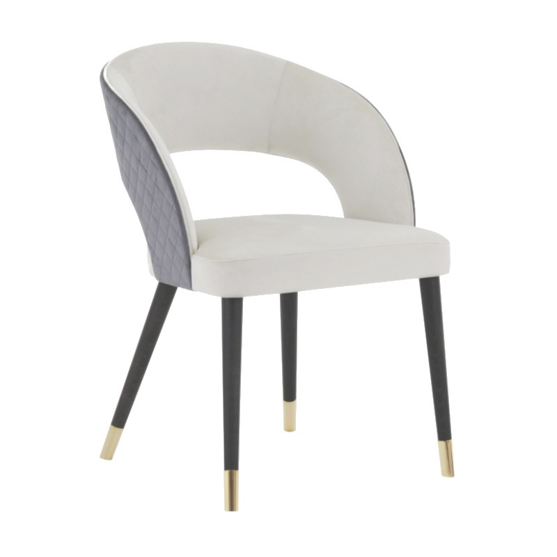 Upholstered Giulia side chair with a white seat and back, gray quilted sides, and black wooden legs with gold tips.