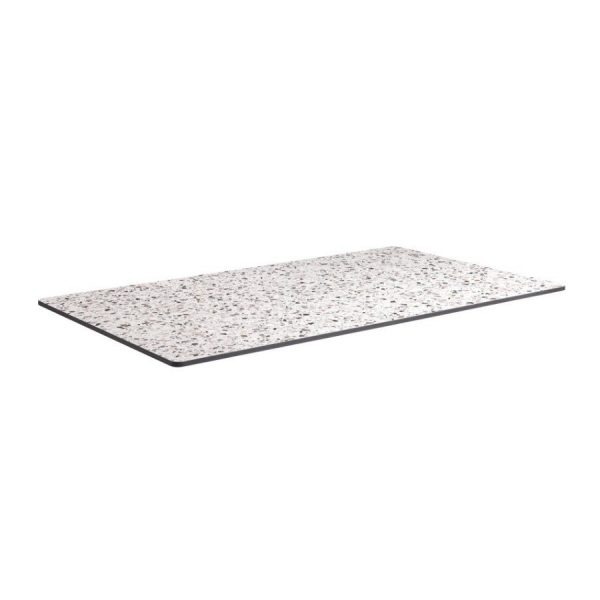 Angled view of a rectangular compact terrazzo laminate top with a black edge.
