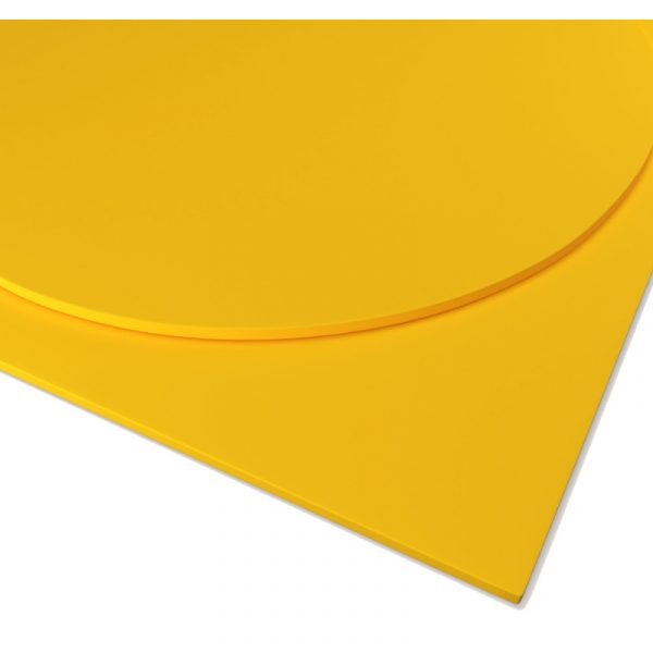 Close-up of a yellow metal painted steel top, showing round and square shapes.