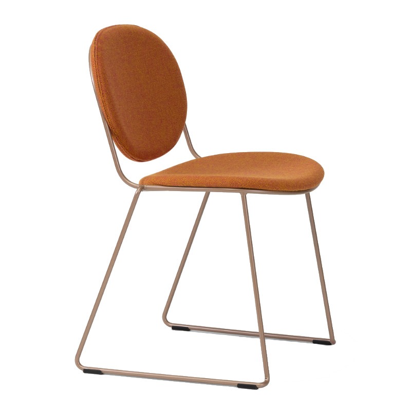 Upholstered Papas C side chair. Metal frame with orange fabric seat and back. Side view.
