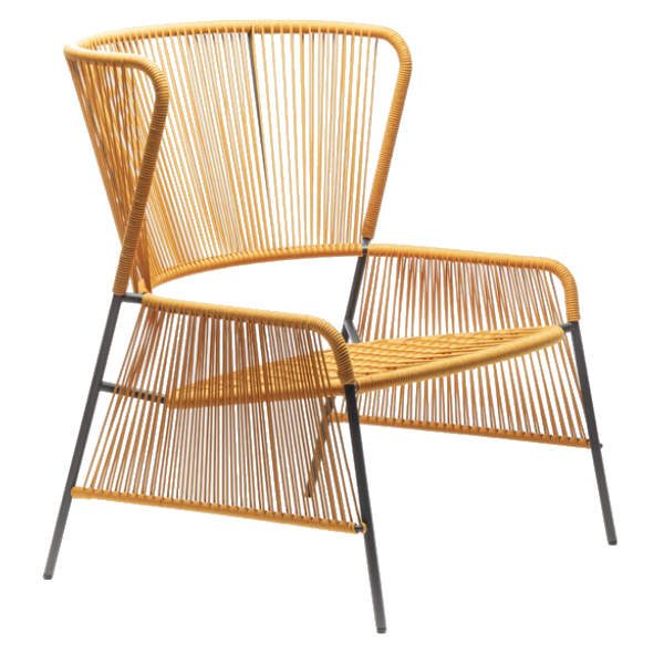 Side view of the Altana lounge chair. The seat and back are woven marine rope in yellow, with a black metal frame.