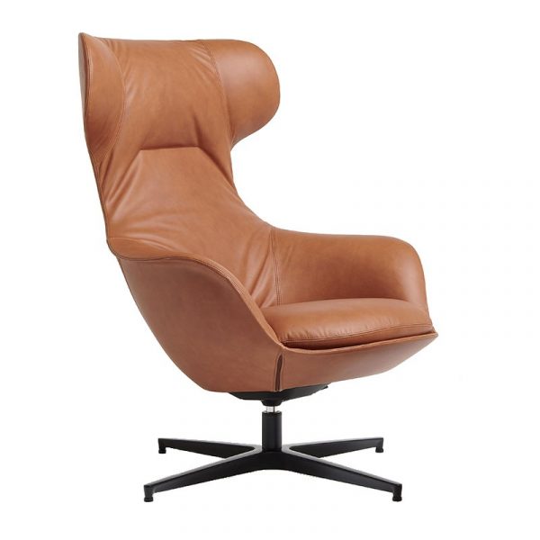 Angled view of a brown leather Musa Swivel Armchair with a 4-star black metal base and a high, supportive back.
