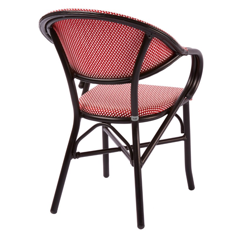 Rear view of Gio armchair. Black frame with red and white checkered upholstered seat and back. Stackable outdoor chair.