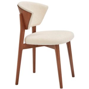 Angled view of a Stella Side Chair. Wood frame with upholstered seat and backrest in cream fabric.