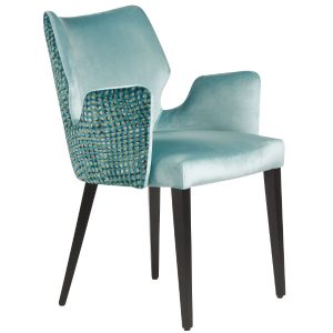 Upholstered Gent armchair in teal. Wooden frame with patterned back. Arm chair, side view.