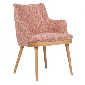 Front view of a Kelly M Armchair. Upholstered in a textured coral fabric with wooden frame and legs.