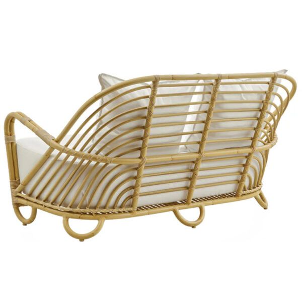 Back view of the Charlotte sofa. Rattan frame with white cushions. Outdoor furniture.