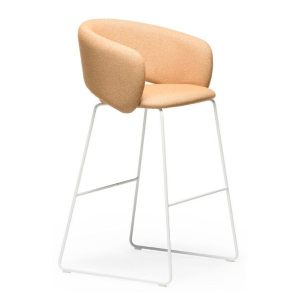 Angled view of the Bel m barstool. Upholstered in light orange fabric with a white metal frame.