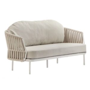 White Soho lounge chair with woven acrylic rope back and upholstered seat and back cushions. Metal frame.