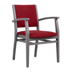 Front view of a Porto Armchair. Upholstered in red fabric with a gray wooden frame.
