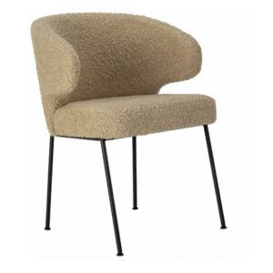 Angled view of a Ciri Armchair featuring a beige, textured upholstery and sleek black metal legs against a white background.