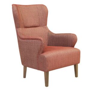 Angled view of a stylish Columbia Lounge Chair upholstered in a textured red fabric with wooden legs.