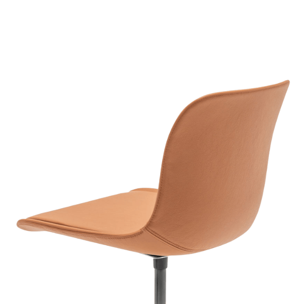 Rear view of the Baltic Classic Desk Chair in tan upholstery. Modern, armless office chair with clean lines and a metal frame.