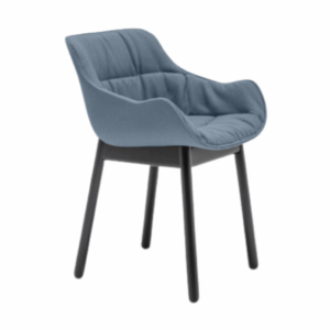 Angled view of a blue Baltic Soft W Armchair with quilted upholstery and black wooden frame, ideal for modern spaces.
