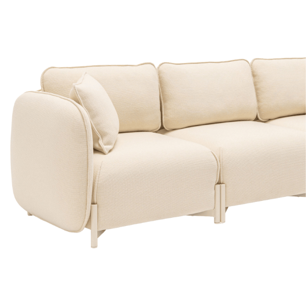 Close-up of a cream Linka Lounge Chair with a metal frame, upholstered seat, rounded arms, and back, ideal for hotel lounges.