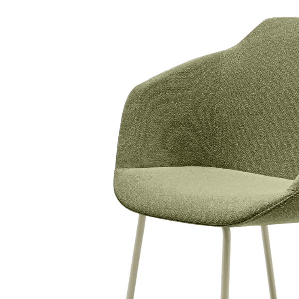 Close-up of the Ultra Armchair in green fabric, showcasing its curved backrest, padded seat, and wooden base. Contemporary design.