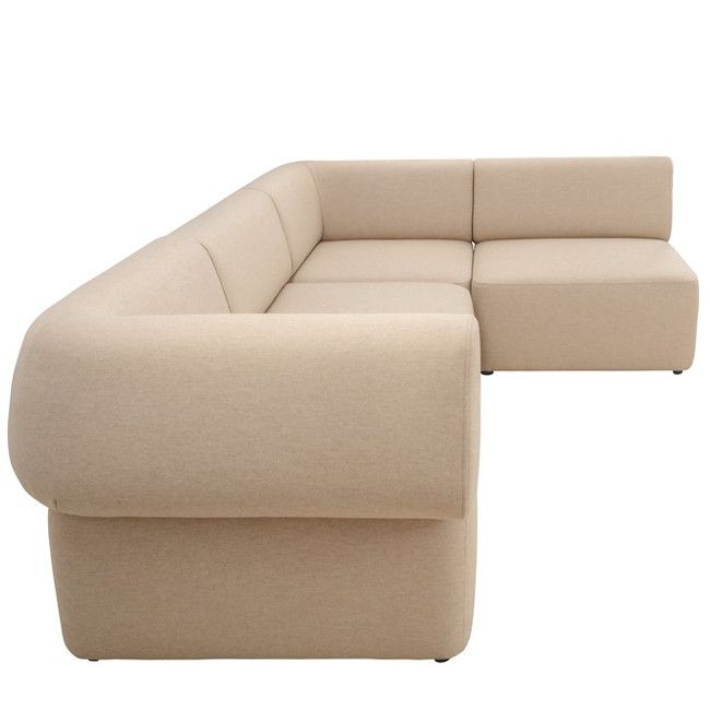 Angled view of a beige upholstered Bold Corner Sofa, modular design, contract furniture for commercial lounge, hotel, or workplace.