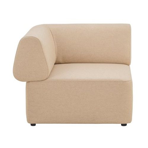 Angled view of a modern, light beige Bold Corner Module. Upholstered seating with a sleek, armless design, perfect for contemporary spaces.