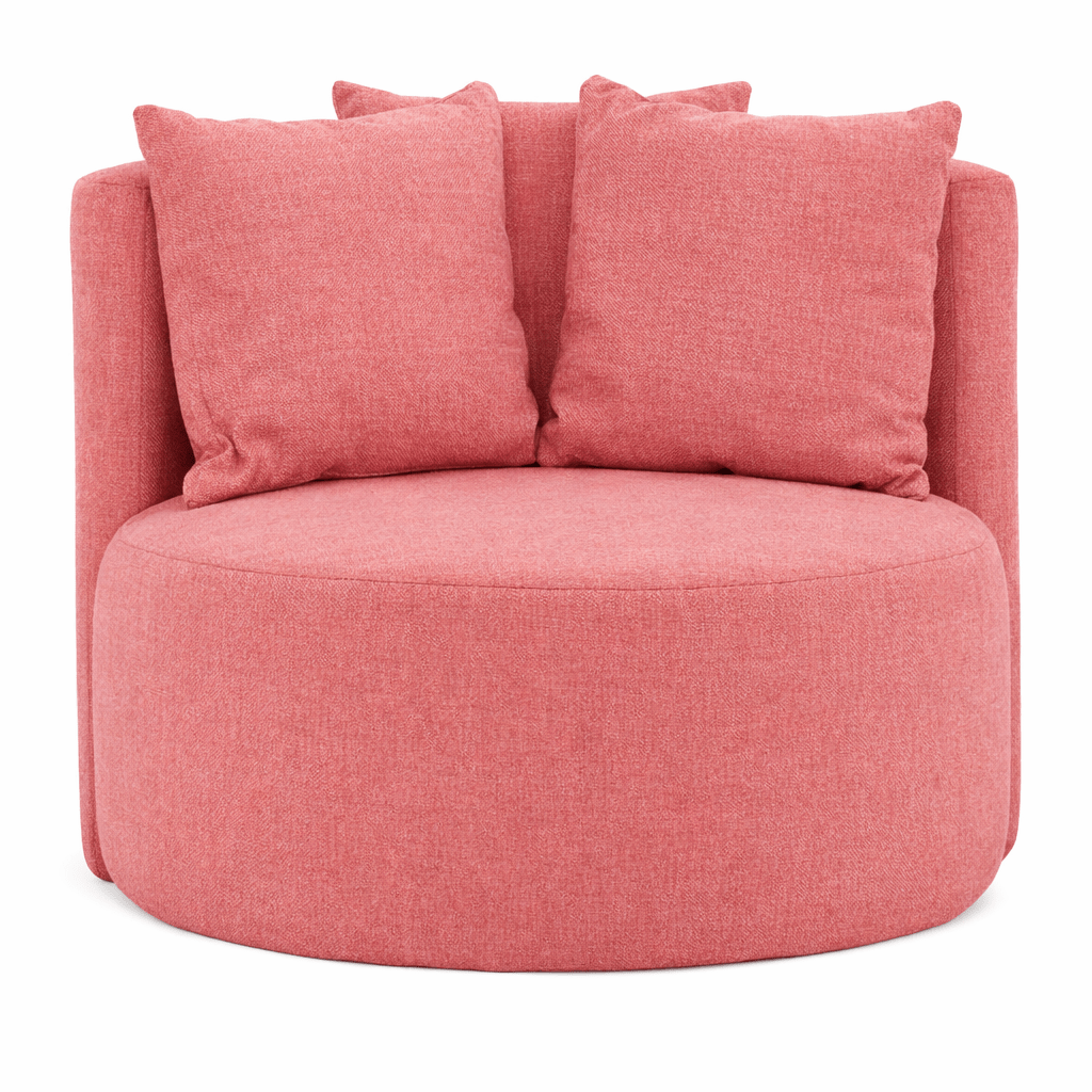Stylish Queens Lounge Chair in textured pink fabric, featuring a rounded seat and back cushions, perfect for modern interiors.