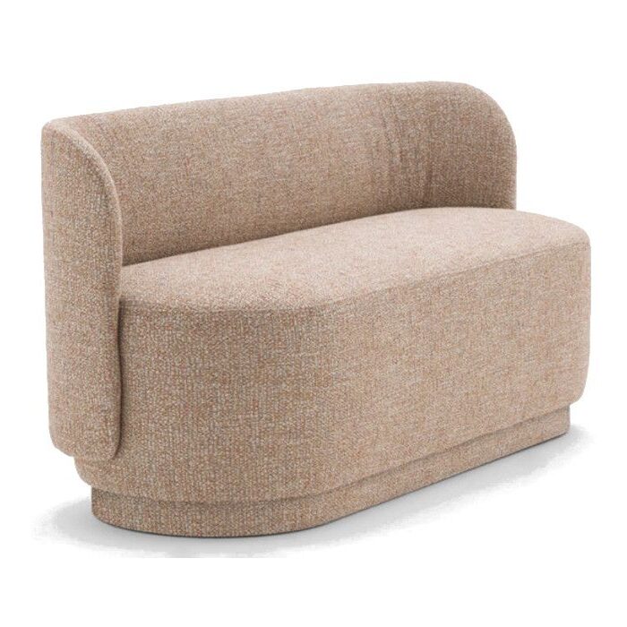 Studio shot, close-up of the Tablet Sofa in light brown fabric, displaying its curved design and fully upholstered base.