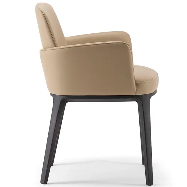 Side view of a beige Mila T Armchair featuring a wooden frame and upholstered seat and back, ideal for restaurants and hotels.
