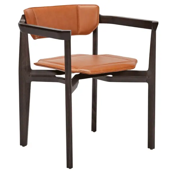 The Rasa Armchair features a brown wooden frame and upholstered tan leather seat and back. Stylish lounge chair.