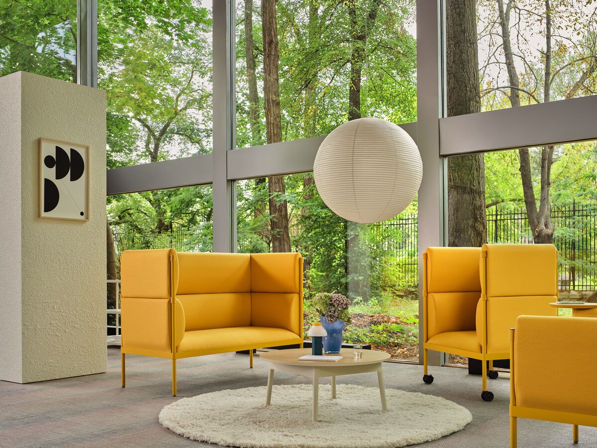 seating_stilt image Inspiring workplace meeting space with yellow contract furniture seating. Stilt chairs provide a modern, comfortable reception area, workplace furniture and hotel furniture